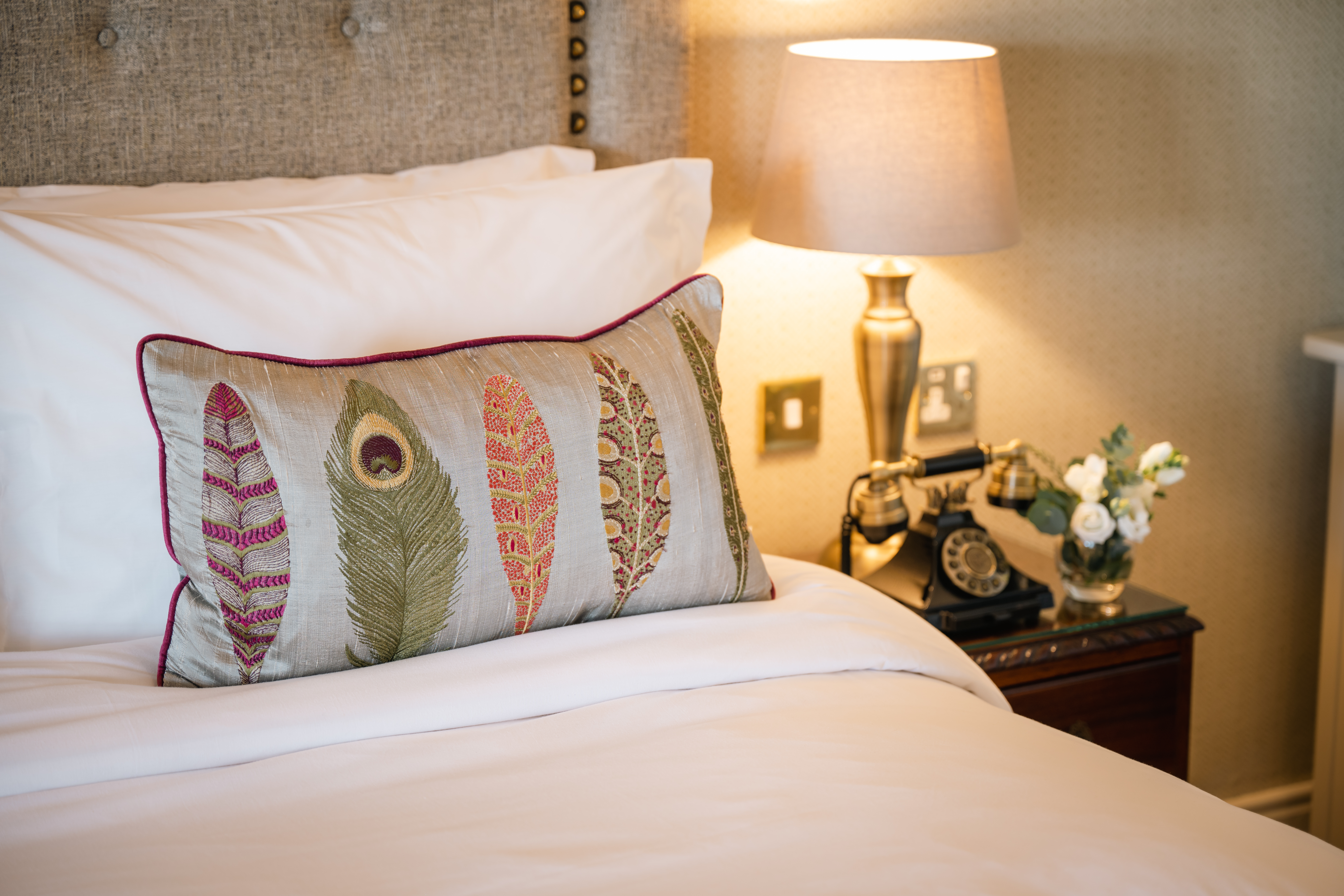 Junior Suite at Ballygarry Estate Hotel and Spa. Close up image of the pillow and bedside locker.