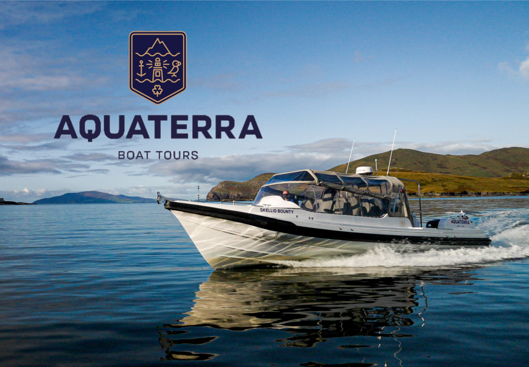A motorboat labeled “Skellig Bounty” moves across calm water with green hills in the background; “Aquaterra Boat Tours” logo appears above.