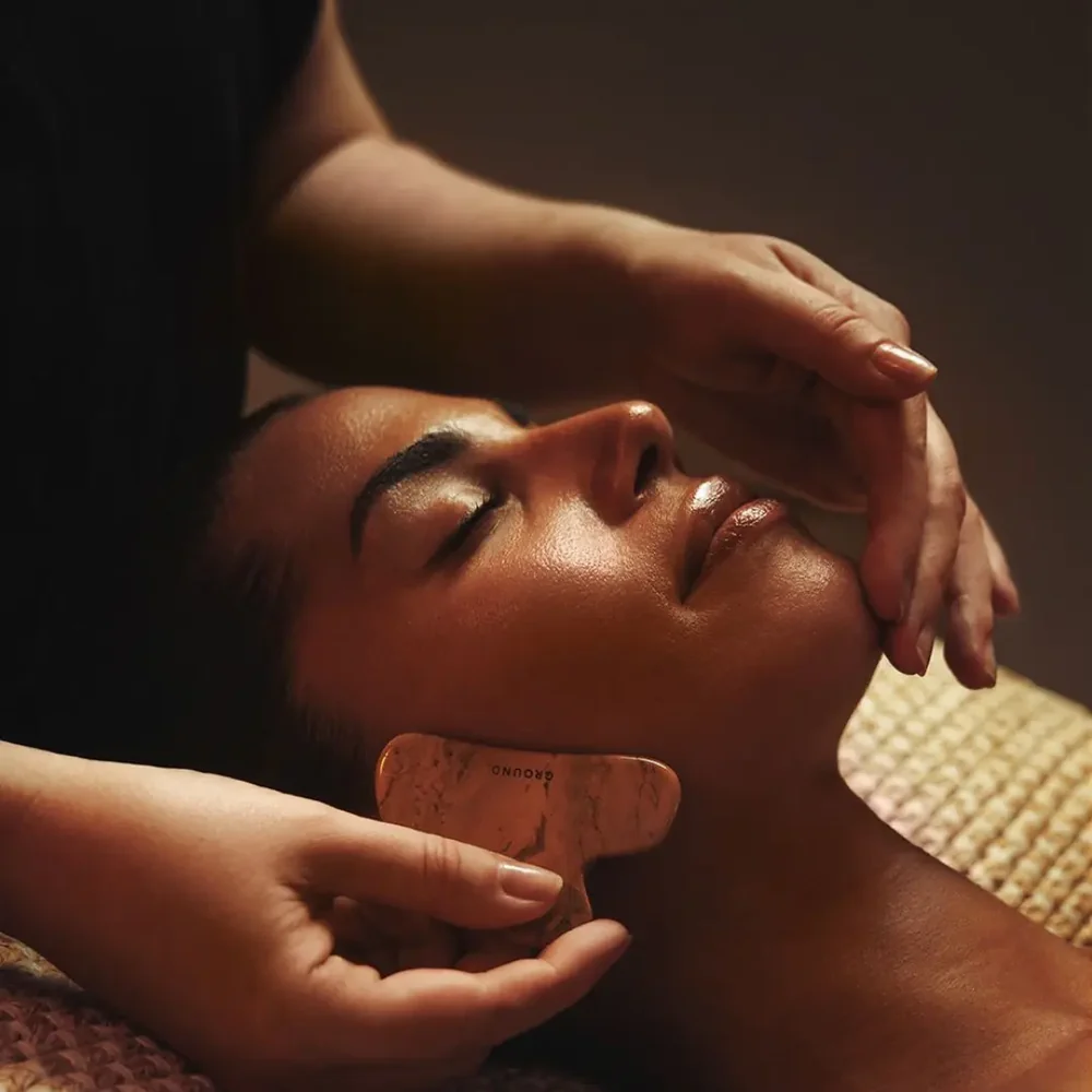 Relaxing spa facial treatment with soothing massage, enhancing guest relaxation experience in luxurious hotel spa.